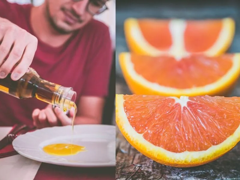 Bottiglia di olio extravergine con bucce d'arancia e rametti di rosmarino pronti per la macerazione