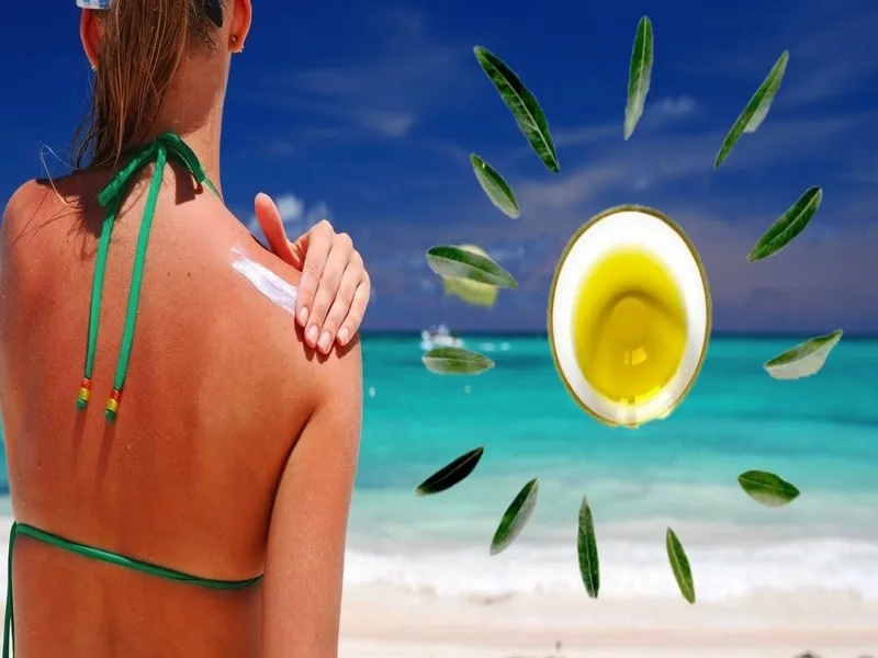 Bottiglia di Olio Extravergine di Oliva usata come rimedio naturale per l'abbronzatura