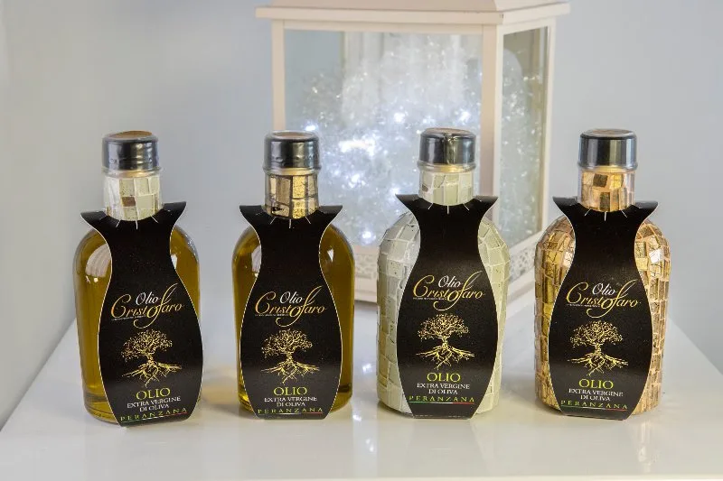 Ampolle di olio extravergine di oliva pensate come bomboniera per la Cresima