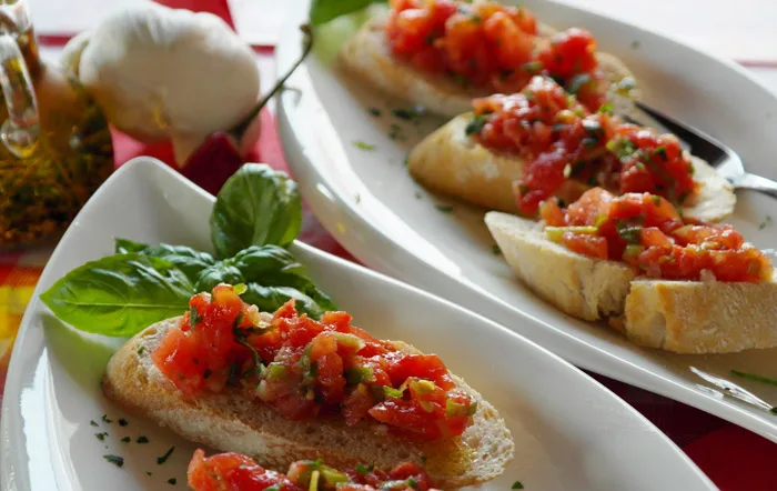 Filo d'olio extravergine versato, simbolo dello studio su glicemia e colesterolo