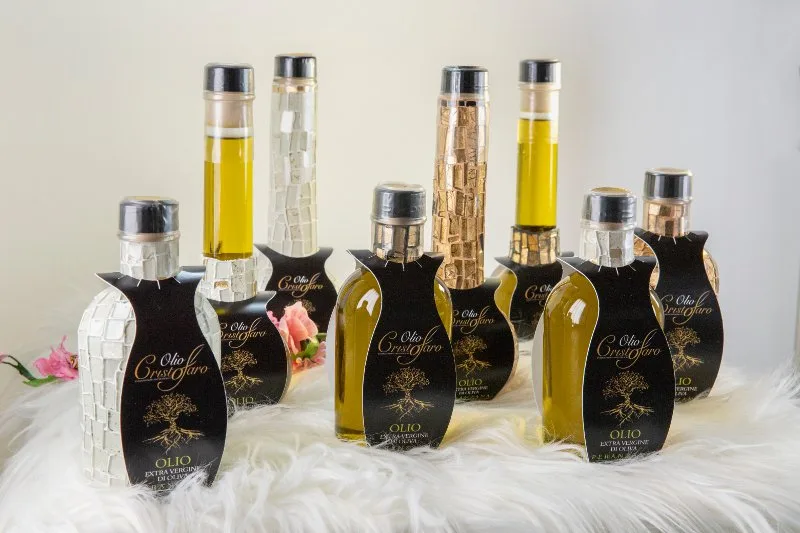Bomboniere enogastronomiche con ampolle di olio extravergine di oliva