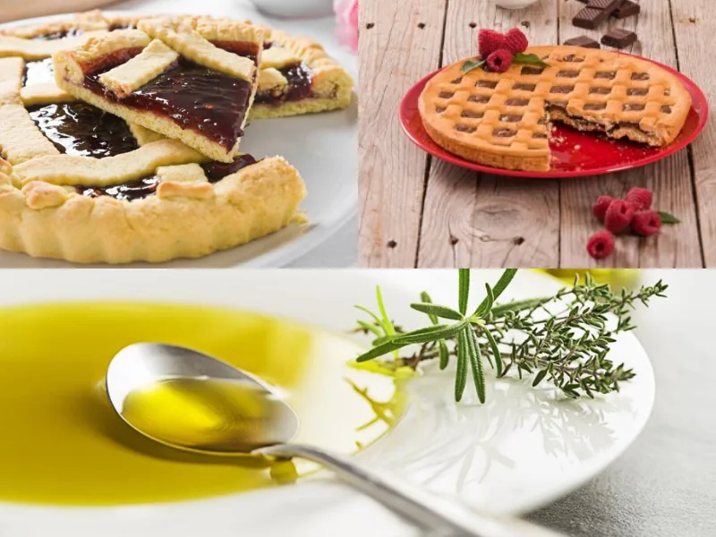 Crostata dorata all'olio di oliva appena sfornata, ripiena di marmellata